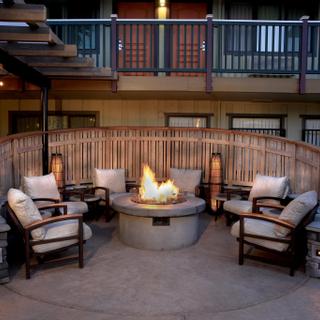 Best Western Plus Humboldt Bay Inn | Eureka, California | Chairs placed around stone fire pit