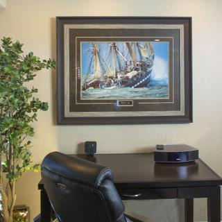 Best Western Plus Humboldt Bay Inn | Eureka, California | Brown desk with black desk chair and picture of ships on wall