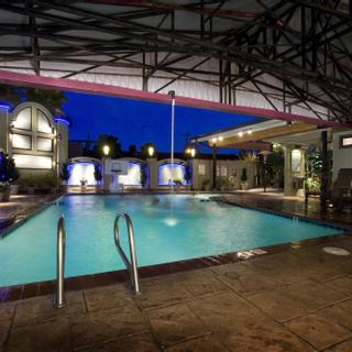 Best Western Plus Humboldt Bay Inn | Eureka, California | Outdoor pool area at night with lights illuminating pool deck