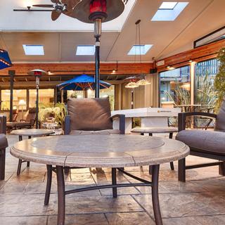 Best Western Plus Humboldt Bay Inn | Eureka, California | White circular patio table and chairs