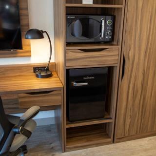 Best Western Plus Humboldt Bay Inn | Eureka, California | Television with desk, chair and microwave
